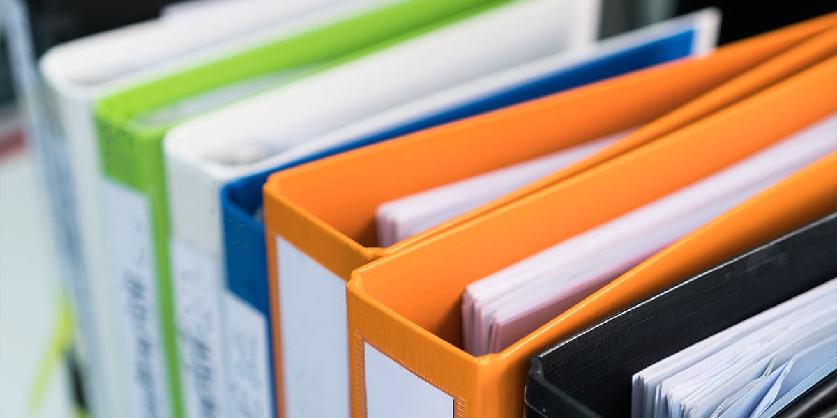 Photograph of multi-colored binders